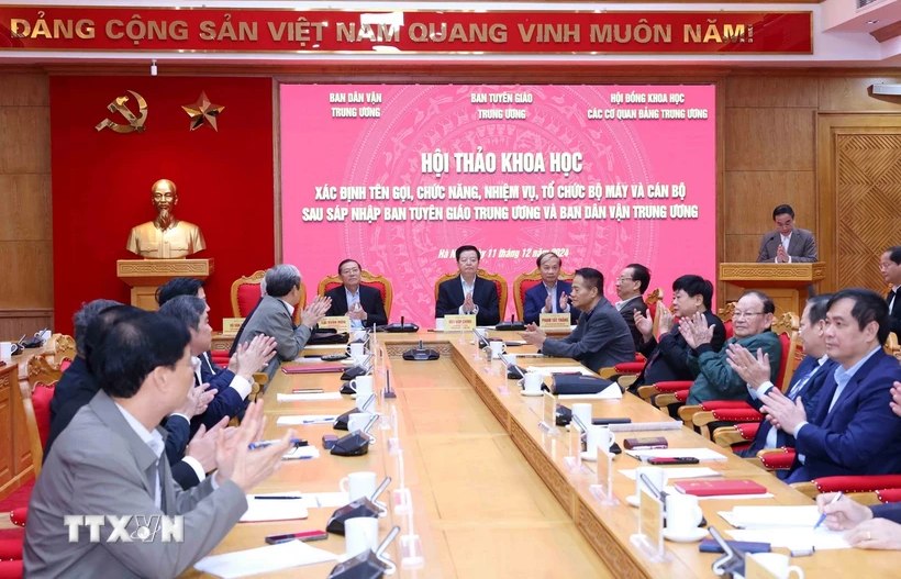 Quang canh hoi thao khoa hoc ve sap nhap Ban Tuyen giao Trung uong va Ban Dan van Trung uong. Anh: Phuong Hoa/TTXVN