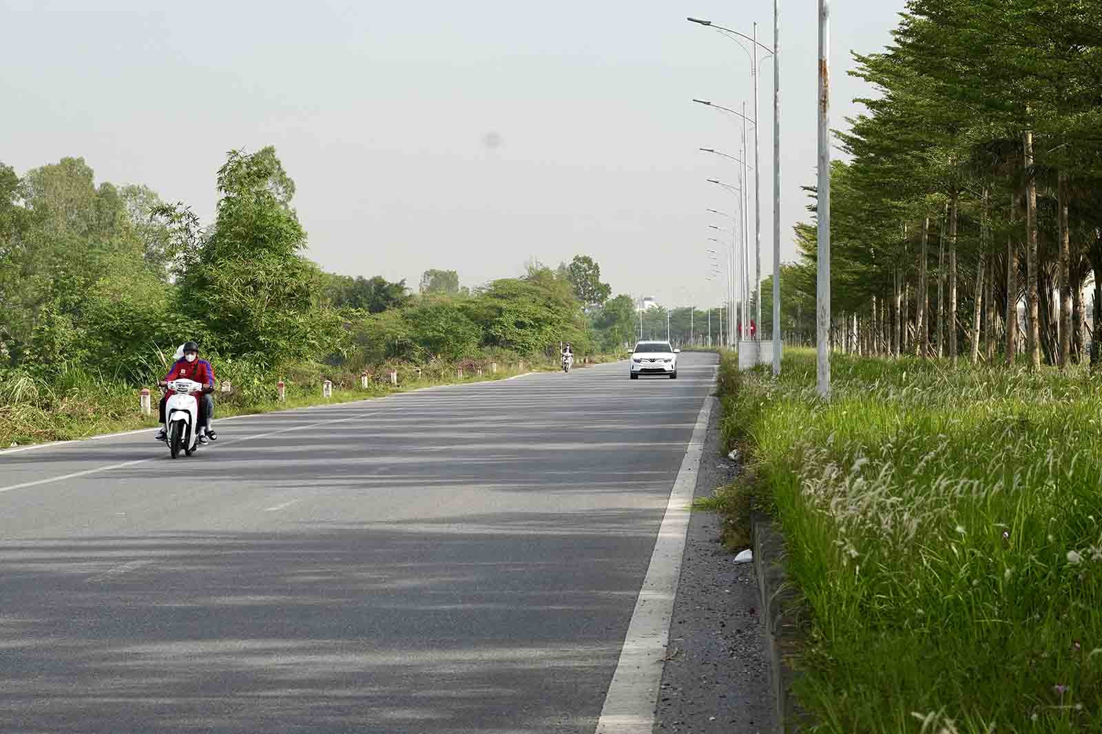 Viec du an da hoan thanh gan 20km giup nguoi dan di lai thuan tien. Anh: Huu Chanh
