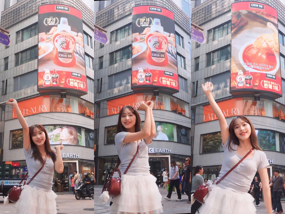 Young people excitedly check-in with Chin-Su chili sauce in Osaka, Japan. Photo: H. Van