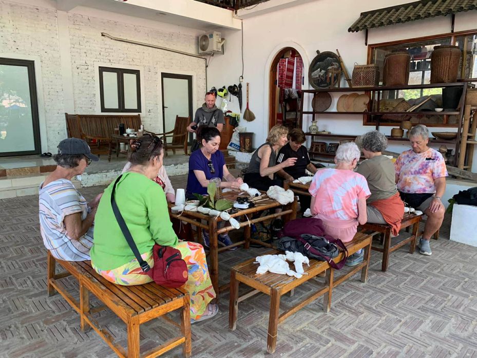 Thai brocade weaving products of Mai Chau are displayed in a booth. Photo: Vi Thi Thuan
