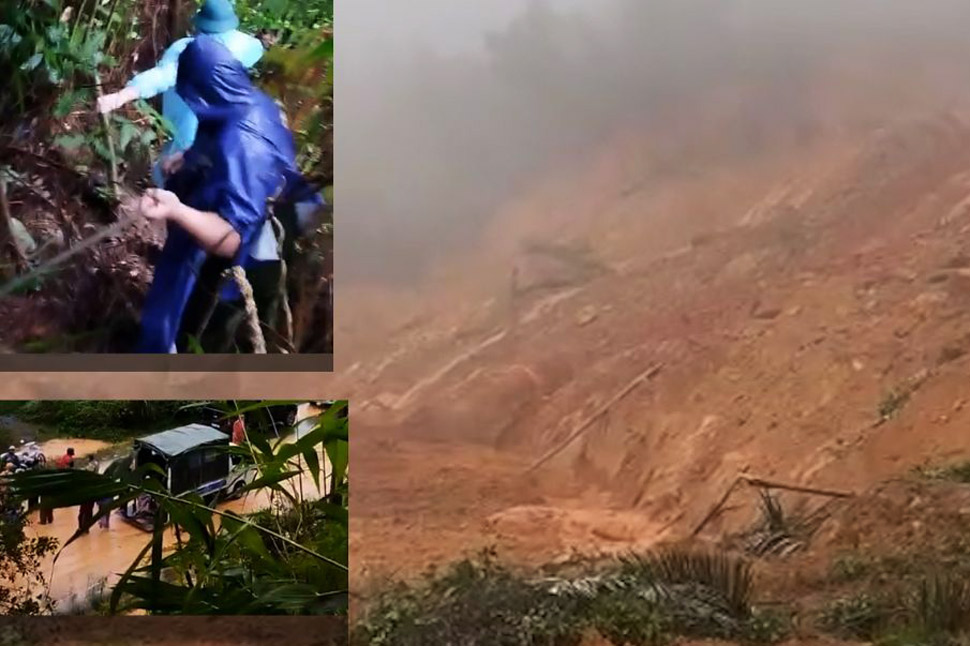 Khanh Hoa provincial authorities used ropes to cross the landslide on Khanh Le pass, rescuing hundreds of trapped people. Photo: Huu Long