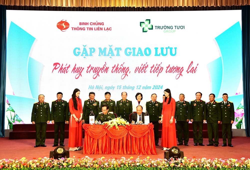 Lanh dao 2 ben da ki ket ban ghi nho hop tac. Anh: Anh Binh