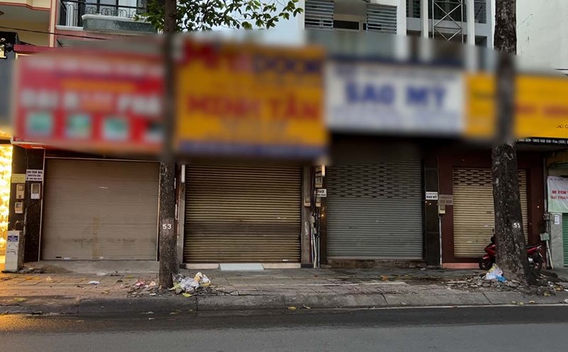A series of stores returned premises on a street specializing in construction materials (District 10, HCMC).