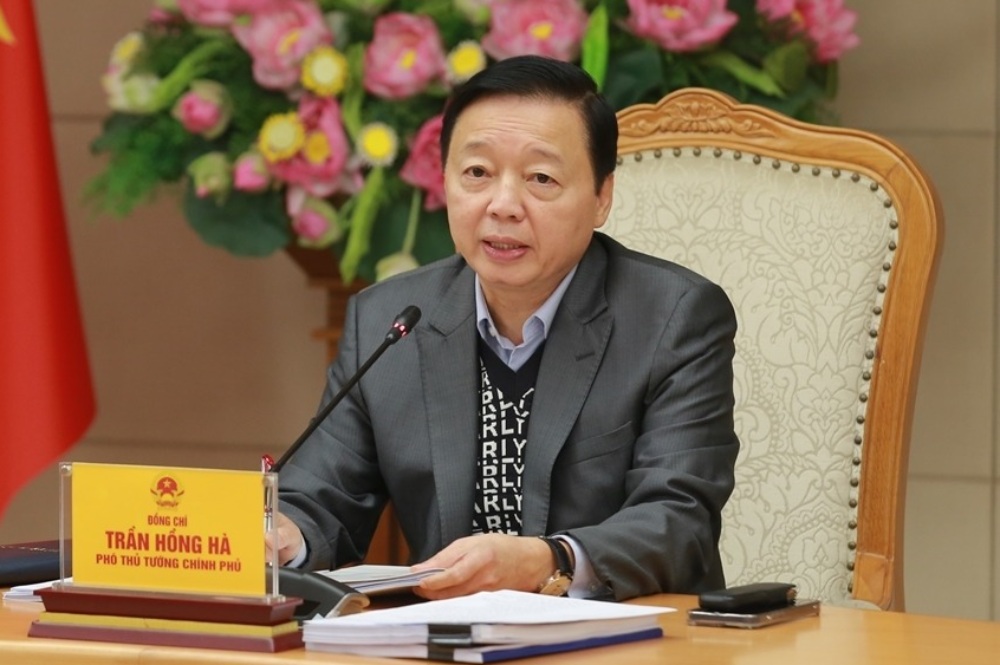 Deputy Prime Minister Tran Hong Ha emphasized the requirement of "merger not being mechanical, joining forces to become stronger". Photo: Hoang Le