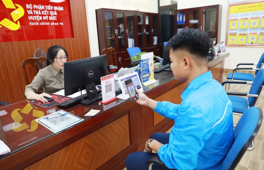 The Government's project aims to have 70% of adults using online public services by 2030. Illustration photo: Nguyen Quang