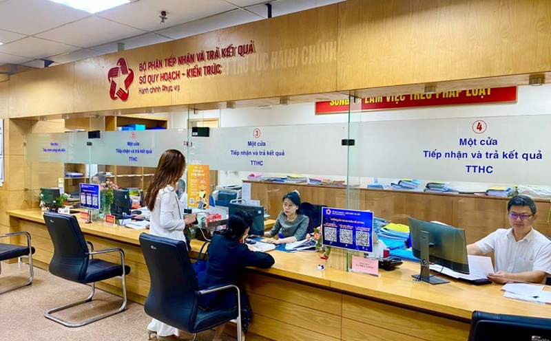 Orientation to arrange and implement the merger of the Department of Planning and Architecture into the Department of Construction and Transport. Photo: Hanoi Department of Planning and Architecture