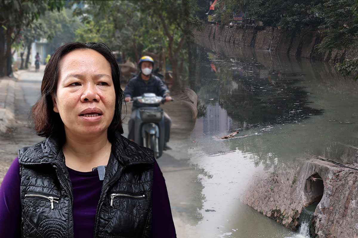 Miserable life next to a rotten river and dusty road in the center of Hanoi