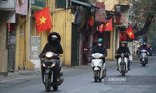 Dự báo thời tiết Tết Dương lịch 2025 ở Hà Nội phổ biến nắng ráo, đêm và sáng trời rét. Ảnh: Tô Thế