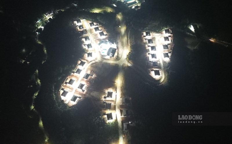 Dozens of houses in Lang Nu sparkle in the night light. Photo: Dinh Dai