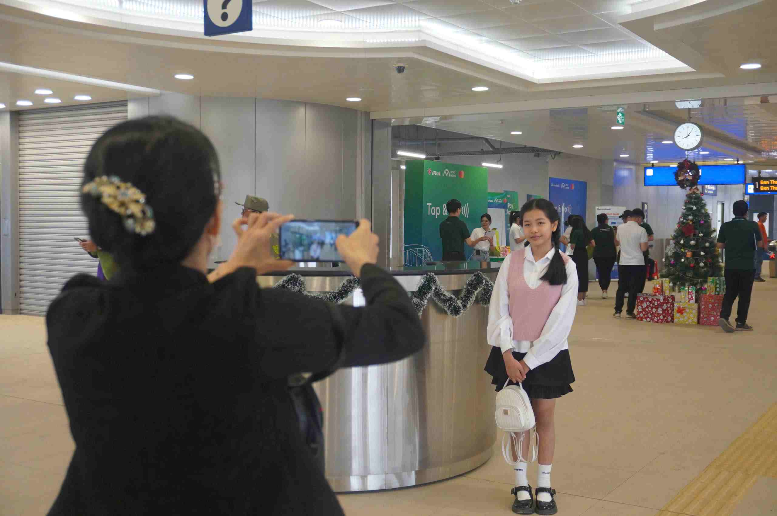 People arrived early to wait for the Metro on the first day of commercial operation
