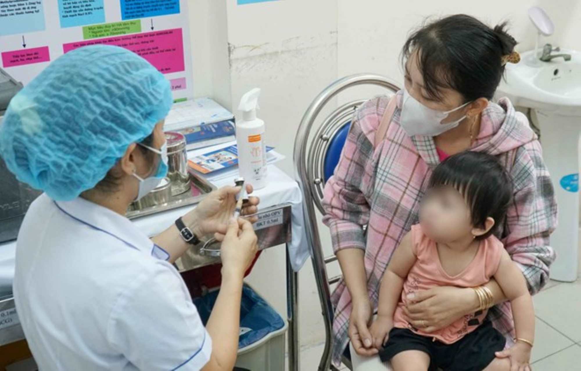 Tre duoc tiem vaccine soi tai TPHCM. Anh: Thanh Chan