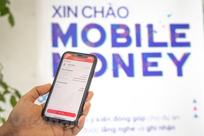 Mobile Money is attracting great attention, reaching more than 9.8 million accounts after 3 years of piloting. Photo: To The.