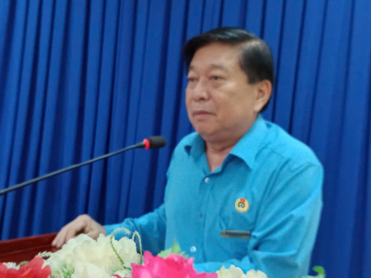 Chairman of Long An Provincial Labor Federation Nguyen Van Qui speaks at the conference. Photo: Ky Quan