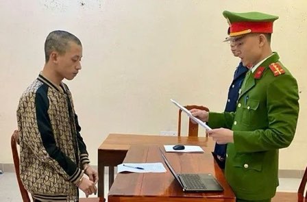 Đối tượng Nguyễn Thành Long tại trụ sở Công an. Ảnh: Nguyễn Đào