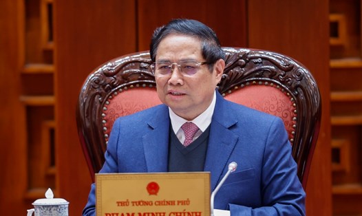 Thủ tướng Chính phủ Phạm Minh Chính chủ trì cuộc họp về rà soát, sắp xếp tổ chức bộ máy của Bộ Quốc phòng, Bộ Công an. Ảnh: VGP