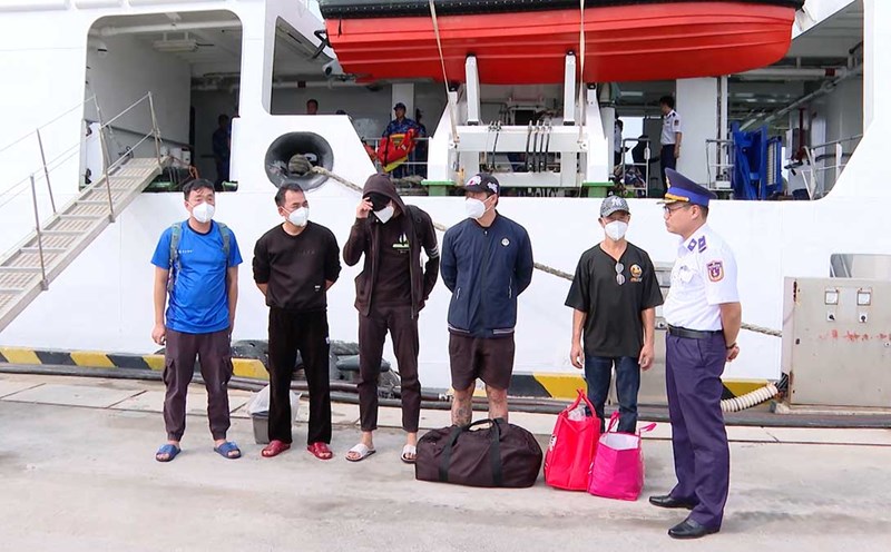 Coast Guard ship brought 5 crew members safely to shore.