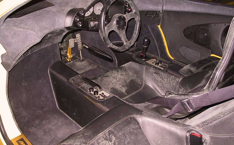 Close-up of the interior of the McLaren F1 supercar owned by the Sultan of Brunei. Photo cut from video