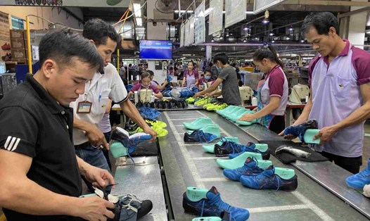 Thúc đẩy kết nối chuỗi cung ứng cho doanh nghiệp dệt may, da giày cần là một trong những ưu tiên hàng đầu. Ảnh: Trần Minh