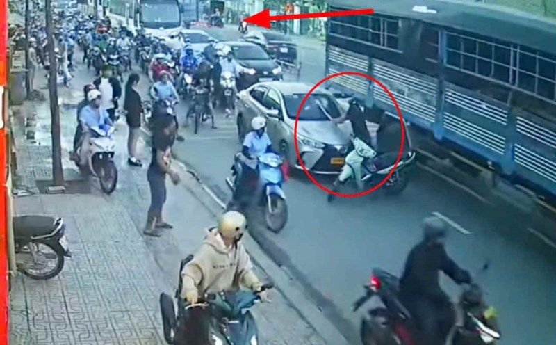 Image of man smashing car after traffic collision. Photo cut from clip