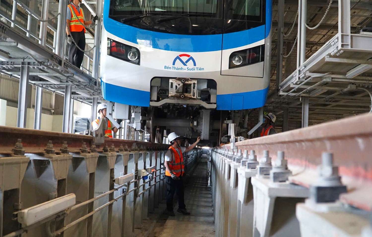 Technicians inspect Metro Line 1 train at Long Binh Depot. Photo: Minh Quan