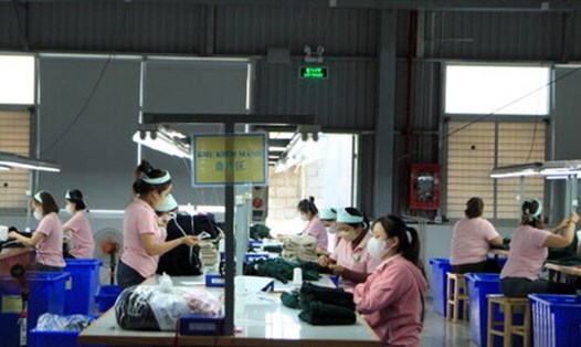 Người lao động làm việc trong khu công nghiệp Hòa Phú, ở thành phố Buôn Ma Thuột. Ảnh: Phan Tuấn