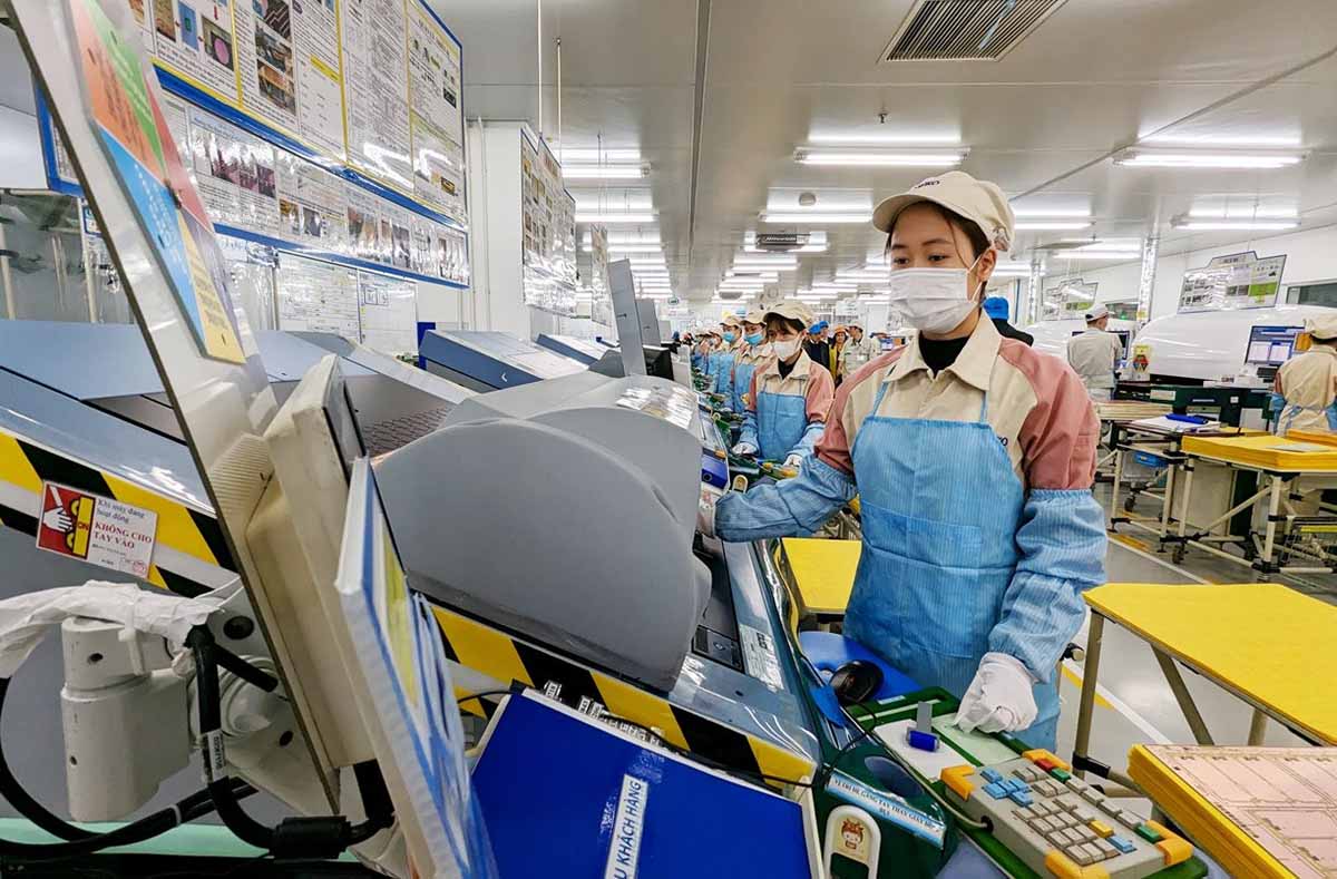 Sản xuất thiết bị điện tử tại Công ty TNHH Điện tử Meiko Việt Nam (Khu công nghiệp Thạch Thất - Quốc Oai, Hà Nội). Ảnh: Lam Giang
