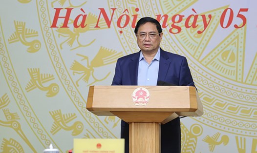 Thủ tướng Chính phủ Phạm Minh Chính chủ trì làm việc với 19 tập đoàn, tổng công ty về đẩy mạnh đầu tư, sản xuất, kinh doanh. Ảnh: Nhật Bắc