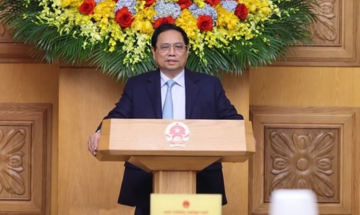 Thủ tướng Chính phủ Phạm Minh Chính chủ trì cuộc làm việc về công tác chuẩn bị tổ chức lễ kỷ niệm 70 năm Ngày Chiến thắng Điện Biên Phủ chiều 26.1. Ảnh: Nhật Bắc