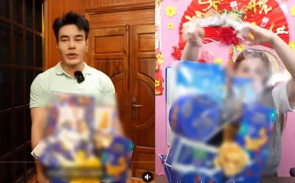 Lê Dương Bảo Lâm và vợ bán giỏ quà Tết. Ảnh: Cắt từ clip