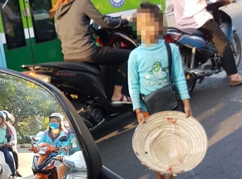 Trẻ em xin ăn trên địa bàn TPHCM. Ảnh: Trường Sơn