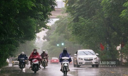 Dự báo Hà Nội có mưa, trời chuyển rét trong ngày mai 19.3. Ảnh: Tô Thế