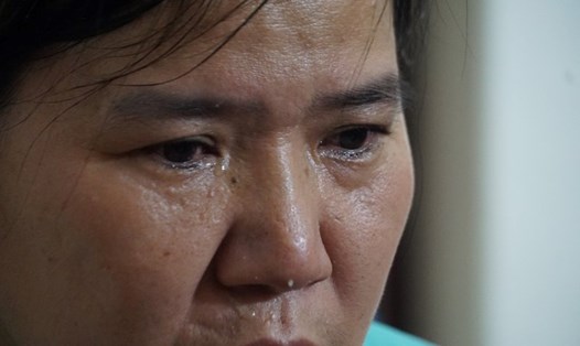 Bà Tạ Thị Minh (50 tuổi, thôn Phương Đàn, xã Lê Hồ, hiện Kim Bảng, tỉnh Hà Nam)  là một trong những lao động bị ảnh hưởng quyền lợi do Công ty Dệt 19.5 nợ BHXH. Ảnh: Tùng  Giang