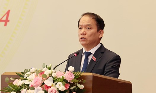 Chủ nhiệm Ủy ban Pháp luật của Quốc hội Hoàng Thanh Tùng trình bày báo cáo. Ảnh: Phạm Đông
