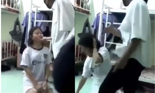 Đoạn clip ghi lại nữ sinh bị bạn học bắt quỳ và dùng tay tát vào mặt tại phòng ký túc xá. Ảnh: Lê Nguyên 