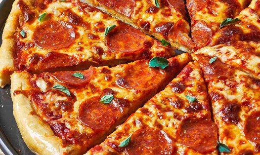 Ăn pizza, kể cả pizza chay sau 8 giờ tối sẽ không thể giảm mỡ bụng và ảnh hưởng mục tiêu giảm cân. Ảnh: Sưu tập