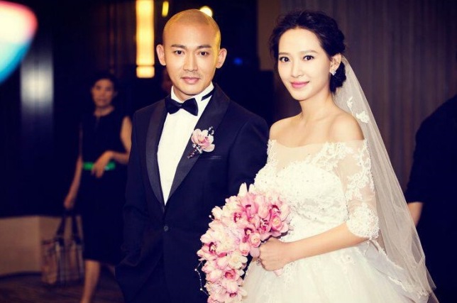 Nhiếp Viễn và Tần Tử Việt kết hôn năm 2014. Ảnh: Sohu