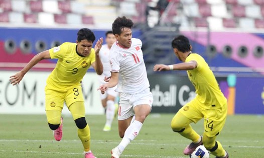 U23 Việt Nam trong trận đấu với U23 Malaysia. Ảnh: VFF