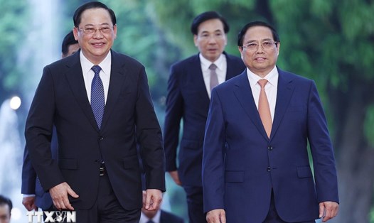 Thủ tướng Chính phủ Phạm Minh Chính và Thủ tướng Lào Sonexay Siphandone. Ảnh: Dương Giang/TTXVN