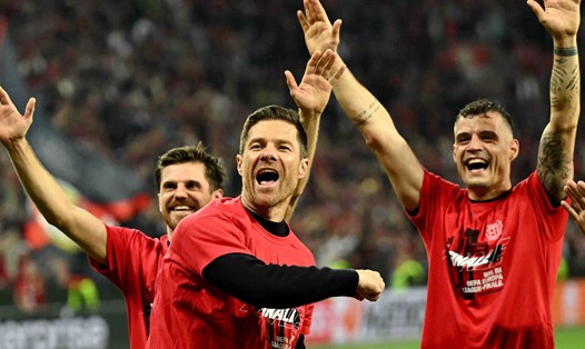 Chỉ còn 4 trận bất bại nữa là đủ để Leverkusen trở thành hiện tượng chưa từng có trong lịch sử bóng đá thế giới. Ảnh: AFP
