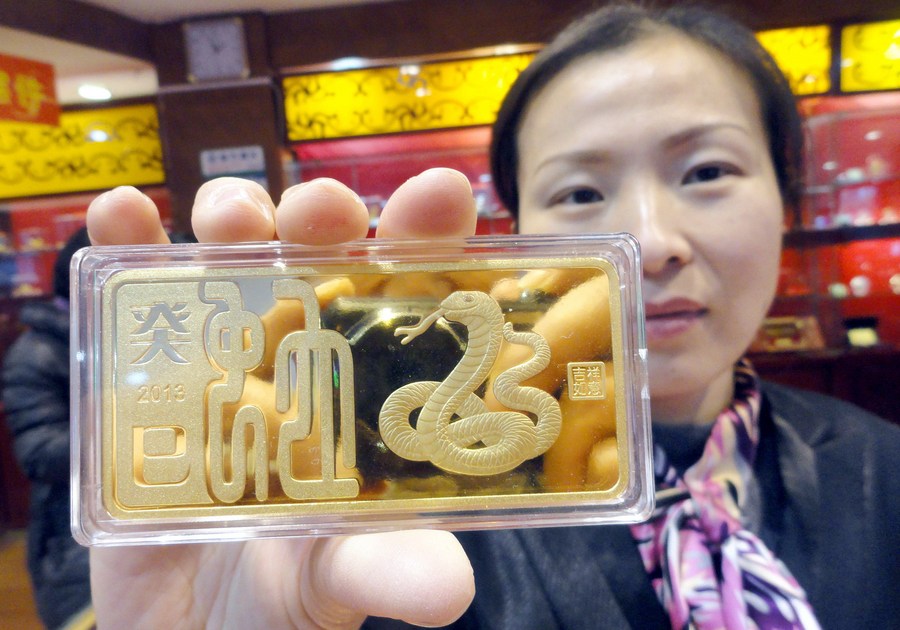 Với việc Trung Quốc bán tài sản bằng đồng USD, lượng vàng nắm giữ trong kho dự trữ chính thức của nước này đã tăng lên. Ảnh minh họa: Xinhua