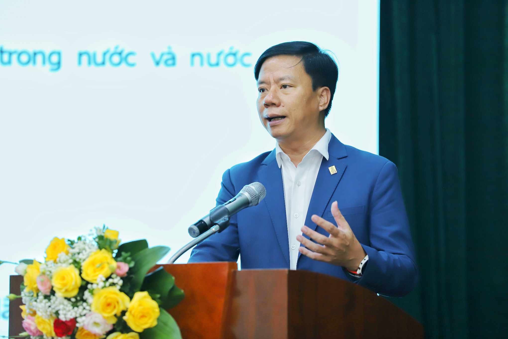Ông Nguyễn Quang Minh - Tổng Giám đốc Công ty Cổ phần Thanh toán Quốc gia Việt Nam (NAPAS) - trình bày tham luận. Ảnh: Tô Thế