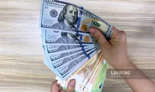 Tỷ giá trung tâm USD/VND được Ngân hàng Nhà nước niêm yết ở mức 24.256 đồng. Ảnh: Trà My