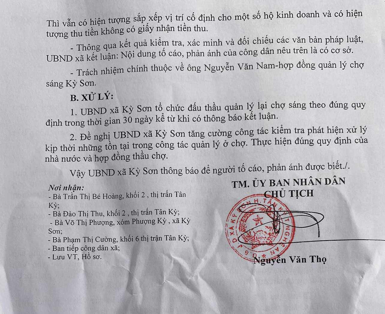 Thông báo kết quả giải quyết tố cáo đối với ông Nguyễn Văn Nam - cán bộ quản lý chợ Sáng (xã Kỳ Sơn, huyện Tân Kỳ, Nghệ An). Ảnh: Quang Đại