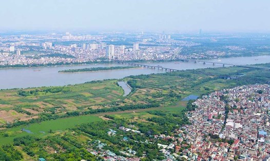 Thành phố Hà Nội sẽ phát triển trục sông Hồng trở thành không gian kiến trúc cảnh quan sinh thái trung tâm của Vùng đô thị Hà Nội. Ảnh: Quang Thái
