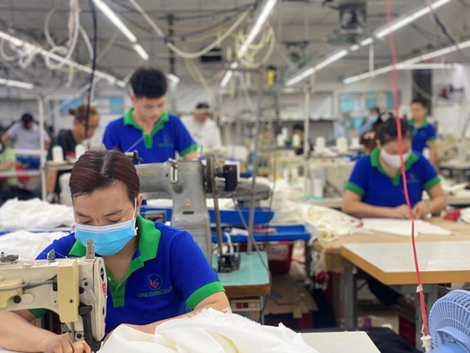 Nhiều Đại biểu Quốc hội đề nghị giữ nguyên quy định mức đóng 2% kinh phí Công đoàn theo quy định hiện hành. Ảnh: Đức Long