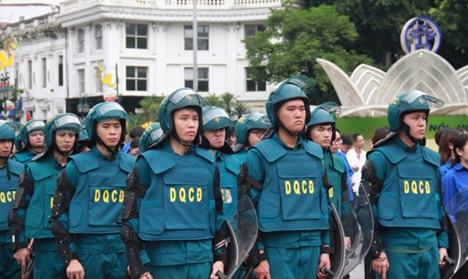 Khối Dân quân cơ động trong lực lượng tham gia bảo vệ an ninh trật tự ở cơ sở. Ảnh: Quang Việt