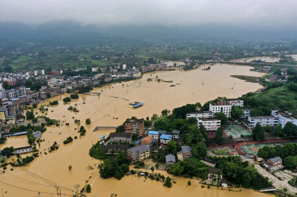 Heavy rain is forecasted continuously along the upper reaches of the river for the next 10 days, and a new flood will enter the Three Gorges Dam reservoir area on July 16. Photo: Xinhua