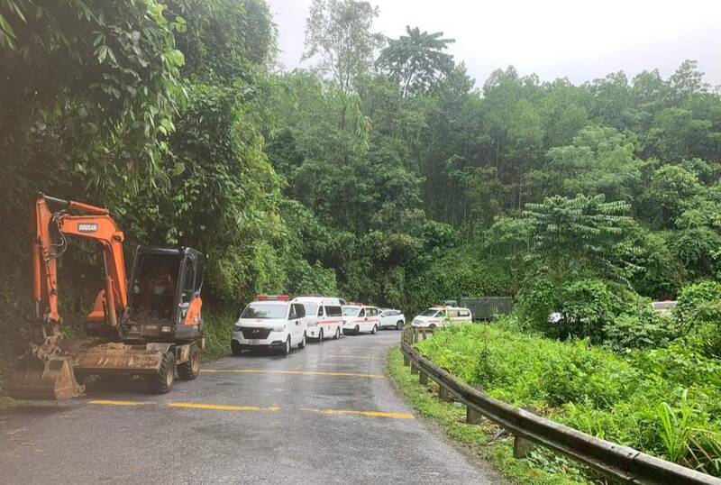 An ambulance was present at the scene of the landslide. Photo: Le La