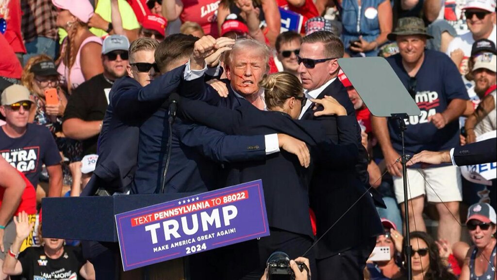 The moment Donald Trump was hit by a bullet on stage on July 13. Photo: AFP