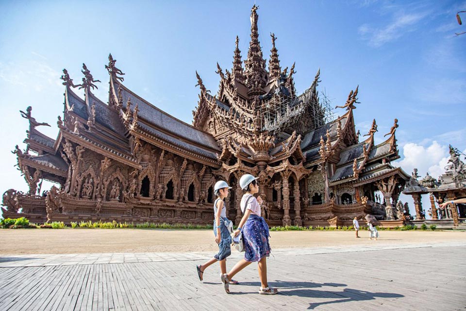 Tourists visit the Temple of Truth in Pattaya, Thailand. Photo: Xinhua
